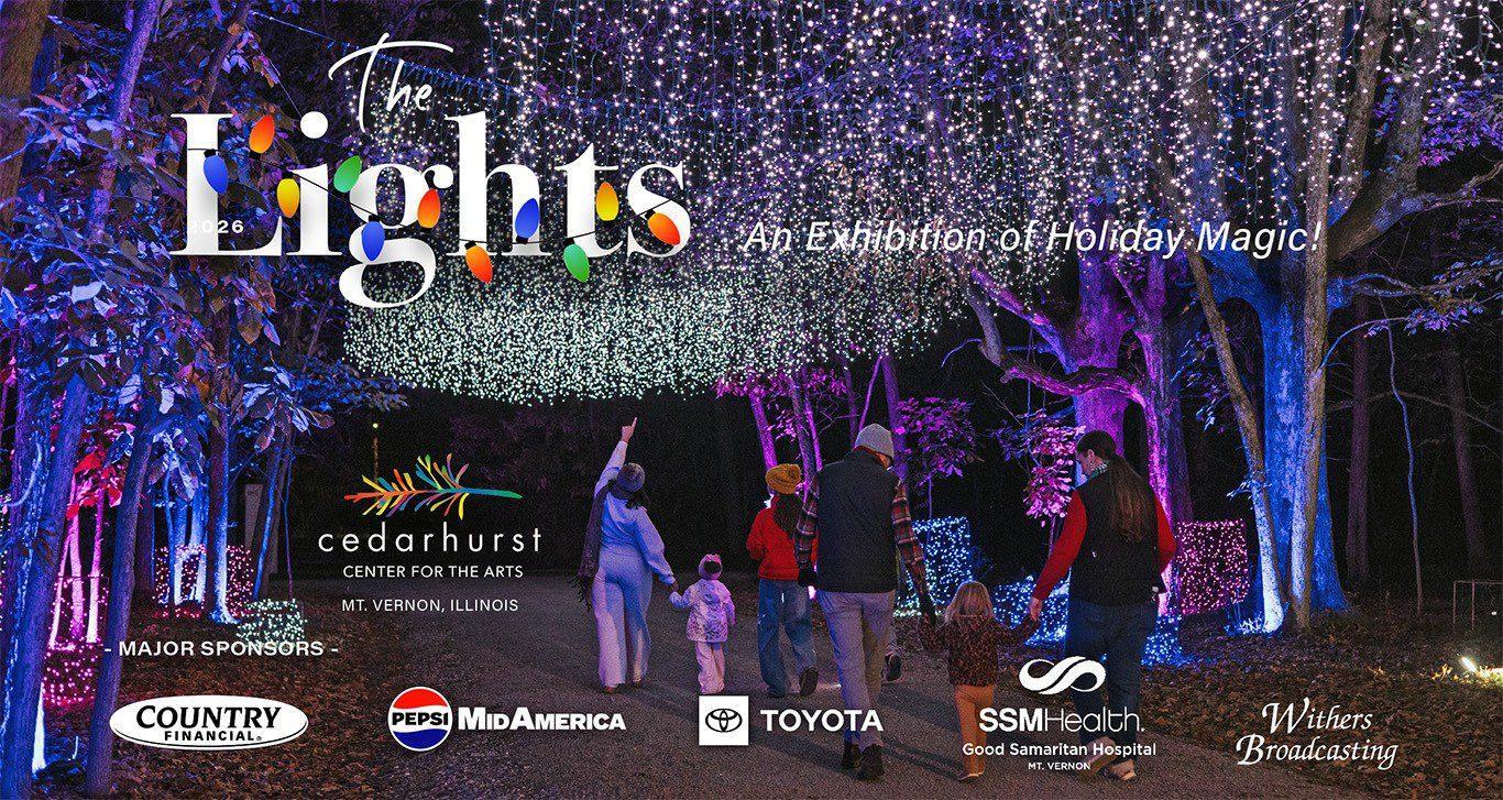 People gather at an outdoor Holiday Lights display